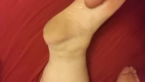 Rubbing my dick on her foot