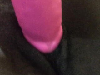 Pink dildo streches chocolate pussy