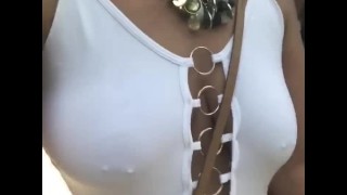 Walking with wife in the park in see through top
