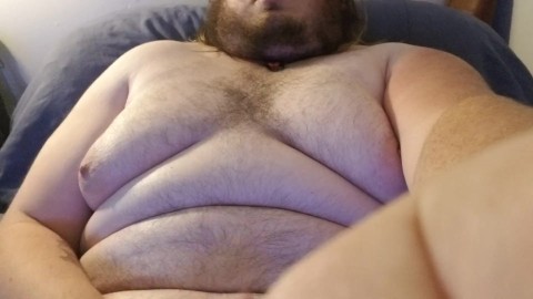 Chubby guy blows huge load on himself.