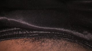 Big cock plays around in gym shorts