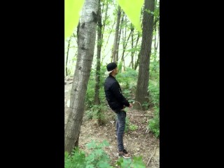 Bad boy jerks while smoking cigarette in a forest – almost caught – so his balls stay full