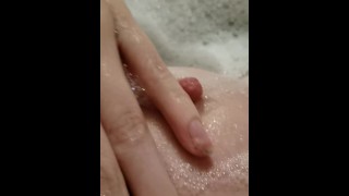 Masturbating in a bubble bath smacking my clit and showing my hairy pussy