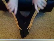 Becky putting on chicken socks