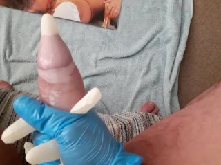 Latex wank with medical gloves and vibrator.