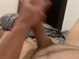 Young Hung Shaved Cock Masturbating with Load of Cum