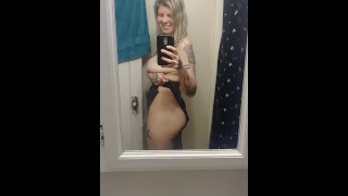 IN THE MIRROR A CUTE TOPLESS TATTOOED BLONDE RIPS FART