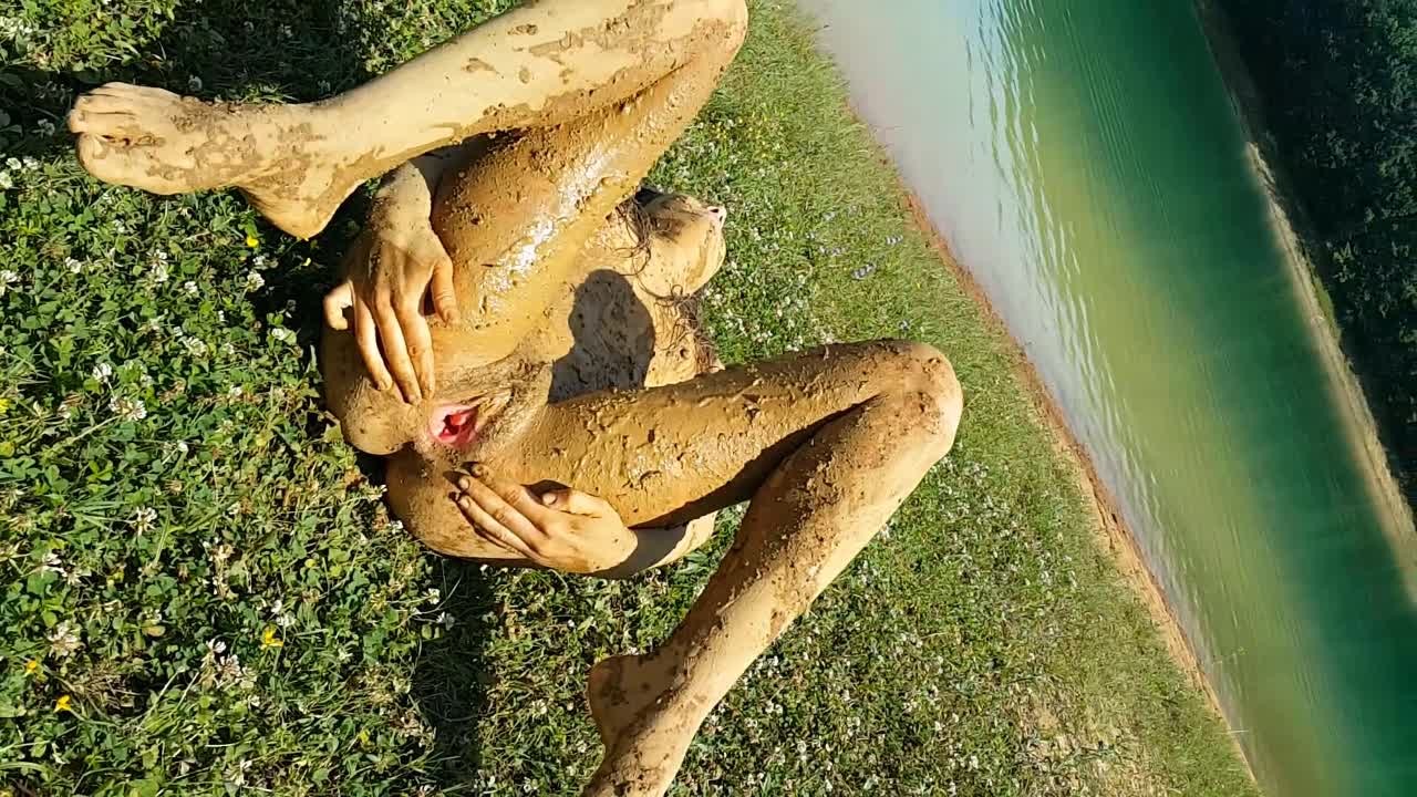 Nude mud bath