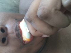Sucking on a popsicle