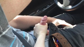 Stroking his cock while he drives..