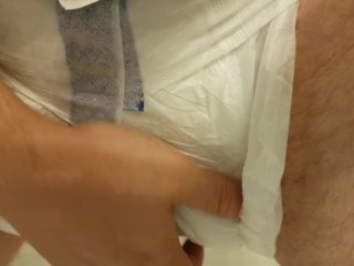 Playing with my diaper filled to the max
