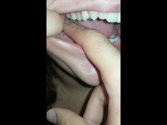 girl biting hard finger
