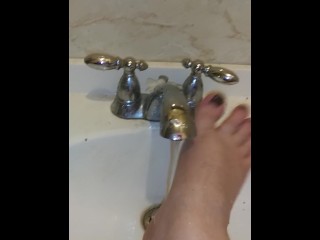 Foot Washing in Sink