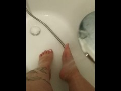 Fat legs feet washing after long day at work