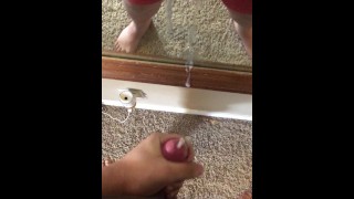 Long jerkoff session ends with load on mirror