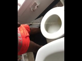 Pissing in the toilet