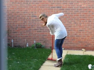 Young Babe Working In The Garden With her Tits Out And Someone Is Spying