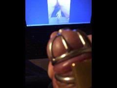 Watching Mistress Souzan squirt and squeezing balls while wearing cockcage