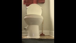 Soldier jacking off on toilet