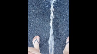 Short Brunette Pees In The Street