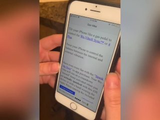 Two teens play with vibe in public restaurant