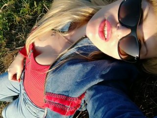 A sunny day & a gorgeous milf sunbathing_in the_field feeling sexy!