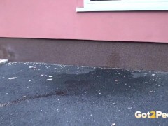 Wandering Brunette Pees In The Parking Lot - Screenshot 16 of 16 - Public