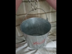 BDSM Pussy Labia Stretching Weight Torture Pissing in a Bucket Clamped Lips