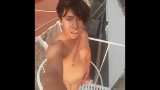 Guy masturbates on the rooftop of the apartments