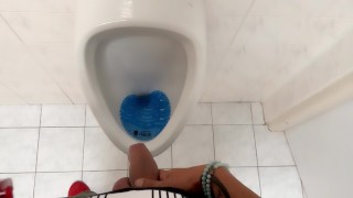 Moaning And Urinating At The Public Urinal In Desperation After Peeing