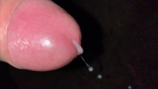 SLOW MOTION close up cumshot and foreskin pulling back and forth