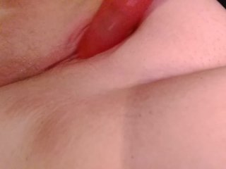 Rubbing clit and fucking big ribbed dildo