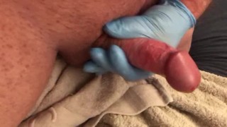 Closeup latex gloves silicone lube MASTURBATION