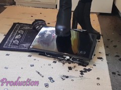 Laptop crushed under sexy high heels