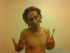 Topless Transgirl Trying to Hold a Pen w/Her Tiny Boobs