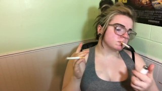 Sexy hot milf smokes two cigarettes at one time