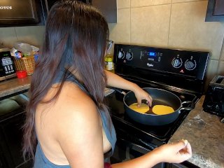 Screen Capture of Video Titled: Milf making tortillas side boob tease