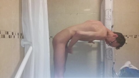 Very skinny teen strokes his very hard cock in bathroom 