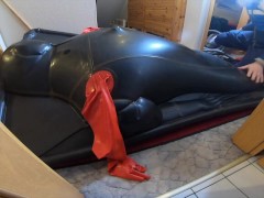 Doll play with inflated deflated drone in vacbed