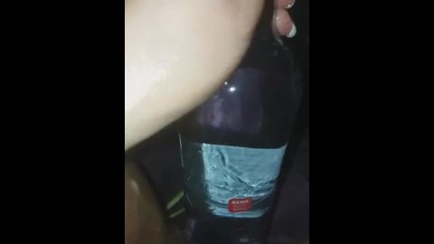 Bottle in a loose pussy 