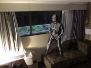 Preview 1 of zentai skeleton jerk off at hotel room window and then room door