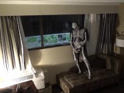 Preview 6 of zentai skeleton jerk off at hotel room window and then room door