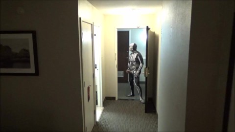 zentai skeleton jerk off at hotel room window and then room door