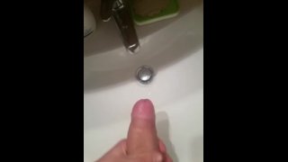 Guy cum into the sink