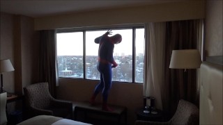spider shoots onto hotel window