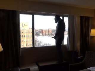 wetsuited masked horny guy comes onto hotel room window