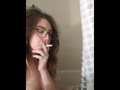 Sexy dread head smoking in the shower