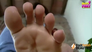 Teen takes off socks and gets barefoot