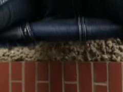 Curvy MILF pulls her pants down and pisses outside on deck in public