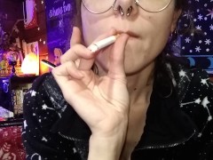 Sexy Hippie Goddess Girl With Dreadlocks Lights and Smokes Cigarette